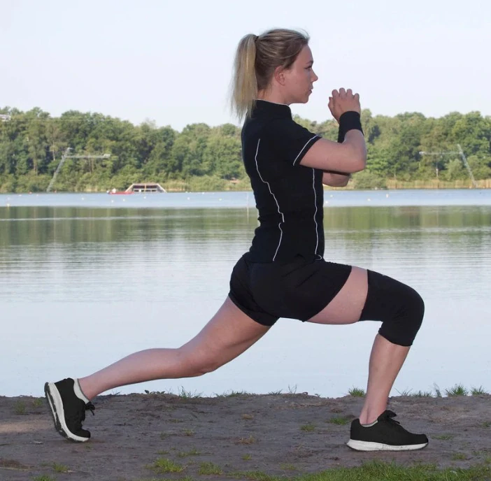 Terapeutická bandáž na koleno Back on Track X-Stretch, černá